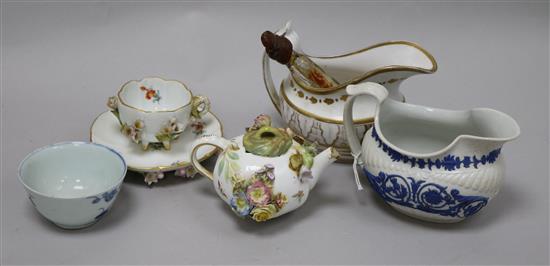 A Meissen floral encrusted cup and saucer, a similar teapot, a Chinese teabowl, two jugs and a scent bottle